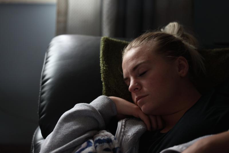 Woman sleeping during the day after facing insomnia 