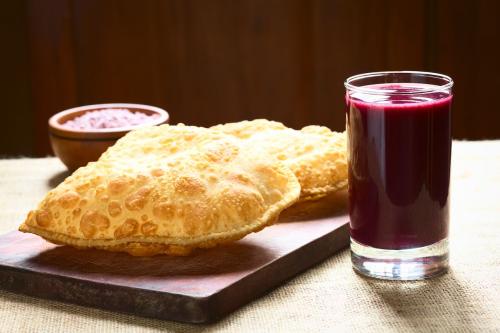 traditional-bolivian-pastry-with-api-morado-drink_1769487970.jpg